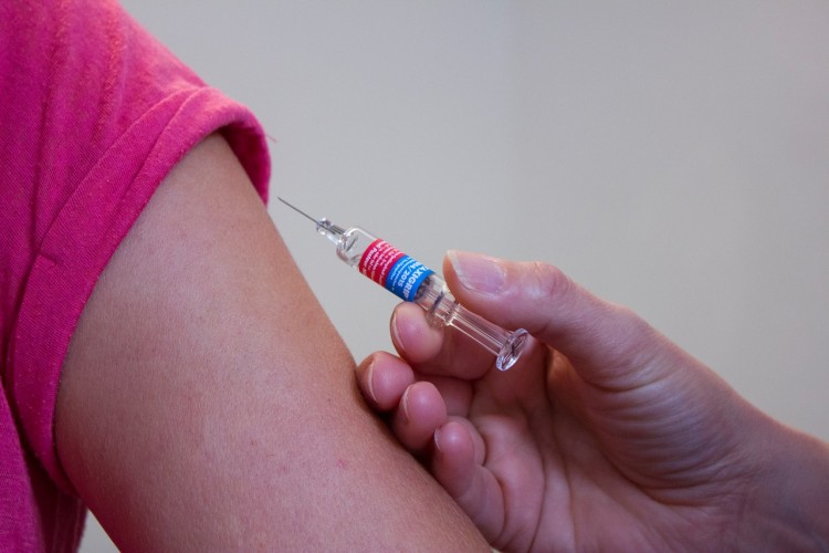 To Re-vaccinate Your Adopted Child or Not? That is the Question.